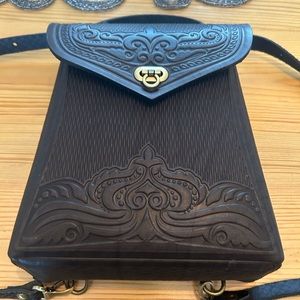 Brand new Custom made black leather back pack.